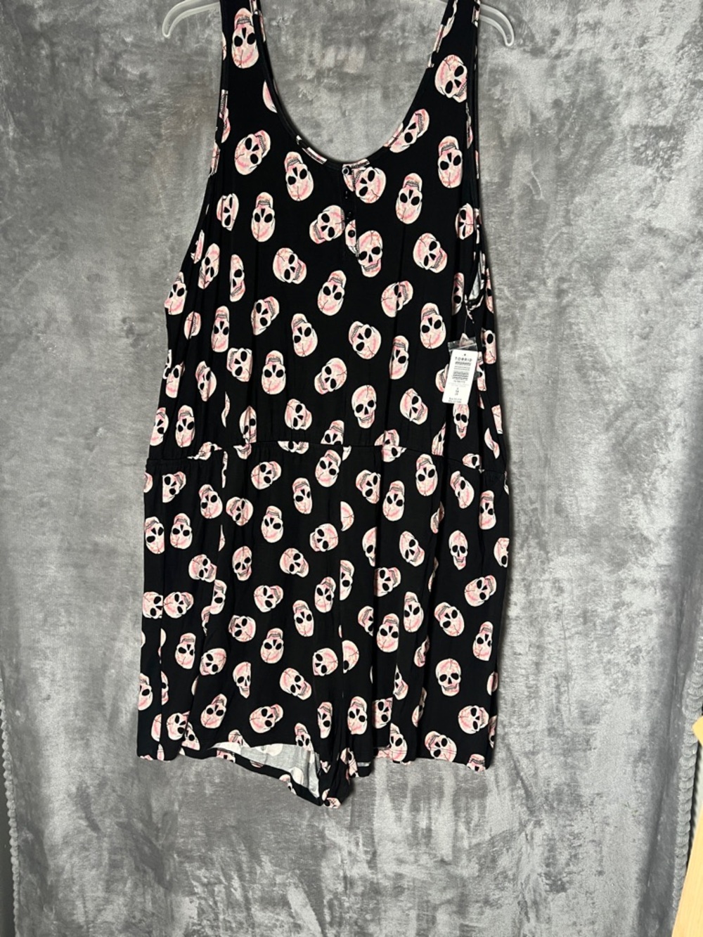 torrid Black Romper with Pink and Cream Skull Print